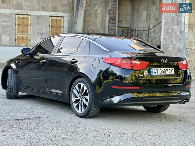 Черный Киа K5, объемом двигателя 2 л и пробегом 102 тыс. км за 12650 $, фото 12 на Automoto.ua