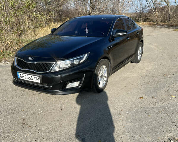 Черный Киа K5, объемом двигателя 2 л и пробегом 196 тыс. км за 9900 $, фото 1 на Automoto.ua