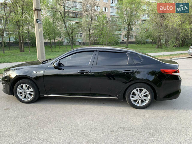 Черный Киа K5, объемом двигателя 2 л и пробегом 263 тыс. км за 11600 $, фото 5 на Automoto.ua