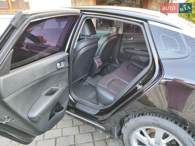 Чорний Кіа K5, об'ємом двигуна 2 л та пробігом 176 тис. км за 10600 $, фото 9 на Automoto.ua
