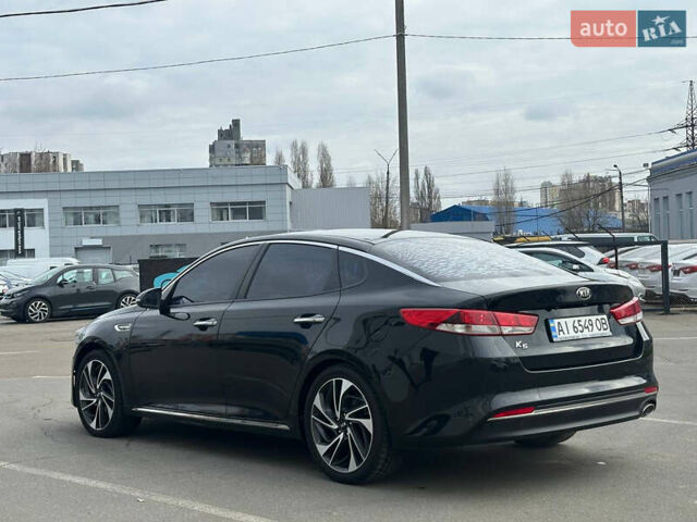Черный Киа K5, объемом двигателя 2 л и пробегом 90 тыс. км за 10500 $, фото 3 на Automoto.ua