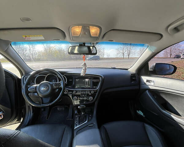 Черный Киа K5, объемом двигателя 2 л и пробегом 196 тыс. км за 9900 $, фото 4 на Automoto.ua