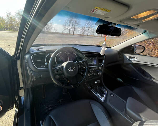 Черный Киа K5, объемом двигателя 2 л и пробегом 196 тыс. км за 9900 $, фото 3 на Automoto.ua