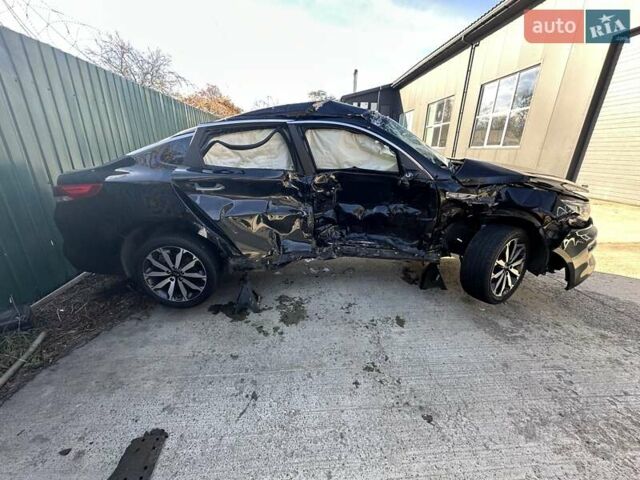 Черный Киа K5, объемом двигателя 2 л и пробегом 140 тыс. км за 5000 $, фото 5 на Automoto.ua