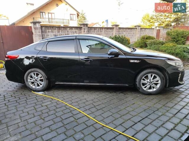 Чорний Кіа K5, об'ємом двигуна 2 л та пробігом 176 тис. км за 10600 $, фото 5 на Automoto.ua