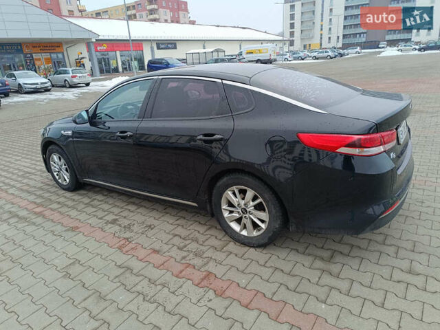 Черный Киа K5, объемом двигателя 2 л и пробегом 209 тыс. км за 11300 $, фото 1 на Automoto.ua