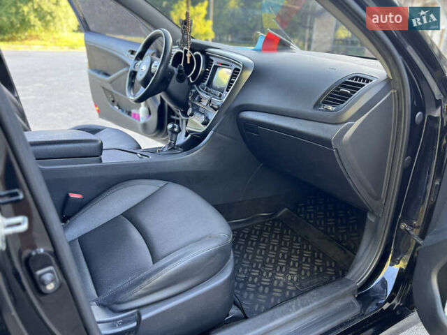 Черный Киа K5, объемом двигателя 2 л и пробегом 102 тыс. км за 12650 $, фото 46 на Automoto.ua