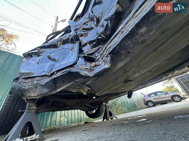 Черный Киа K5, объемом двигателя 2 л и пробегом 140 тыс. км за 5000 $, фото 18 на Automoto.ua