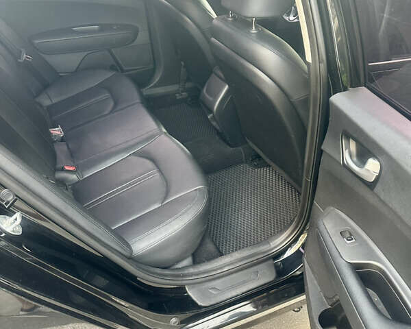 Черный Киа K5, объемом двигателя 2 л и пробегом 241 тыс. км за 13300 $, фото 12 на Automoto.ua