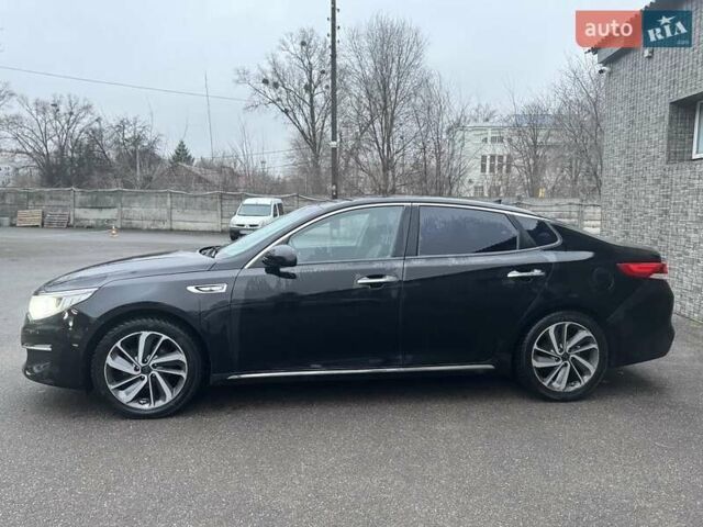 Черный Киа K5, объемом двигателя 2 л и пробегом 330 тыс. км за 10800 $, фото 1 на Automoto.ua