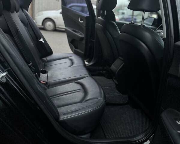Черный Киа K5, объемом двигателя 2 л и пробегом 330 тыс. км за 10800 $, фото 10 на Automoto.ua