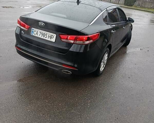 Чорний Кіа K5, об'ємом двигуна 2 л та пробігом 276 тис. км за 13200 $, фото 10 на Automoto.ua