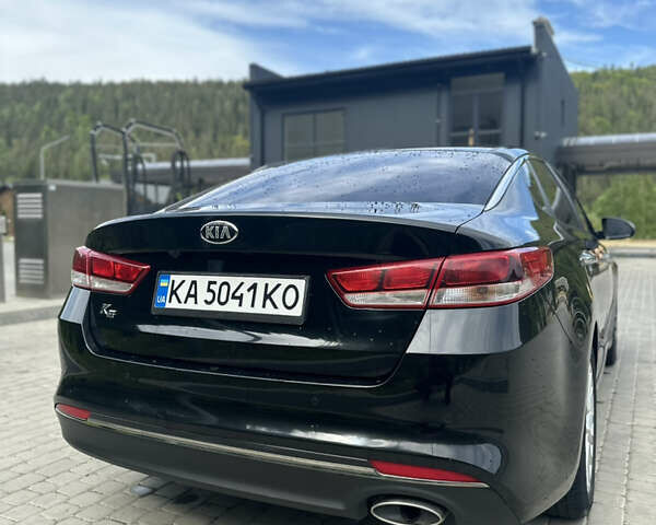 Черный Киа K5, объемом двигателя 2 л и пробегом 192 тыс. км за 12000 $, фото 5 на Automoto.ua
