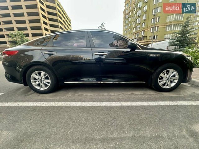 Черный Киа K5, объемом двигателя 2 л и пробегом 241 тыс. км за 13300 $, фото 2 на Automoto.ua