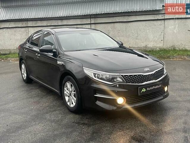 Черный Киа K5, объемом двигателя 1.7 л и пробегом 190 тыс. км за 12999 $, фото 2 на Automoto.ua