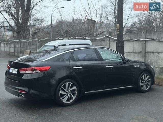 Черный Киа K5, объемом двигателя 2 л и пробегом 330 тыс. км за 10800 $, фото 3 на Automoto.ua