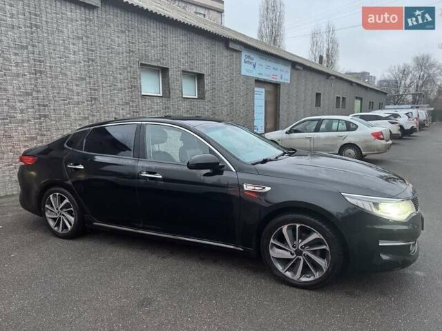 Черный Киа K5, объемом двигателя 2 л и пробегом 330 тыс. км за 10800 $, фото 2 на Automoto.ua