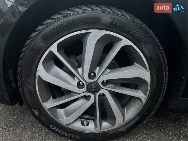 Черный Киа K5, объемом двигателя 2 л и пробегом 330 тыс. км за 10800 $, фото 11 на Automoto.ua