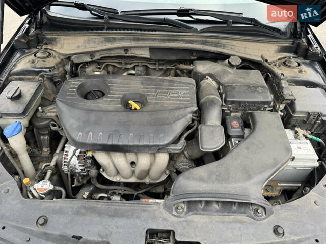 Чорний Кіа K5, об'ємом двигуна 2 л та пробігом 315 тис. км за 11500 $, фото 12 на Automoto.ua