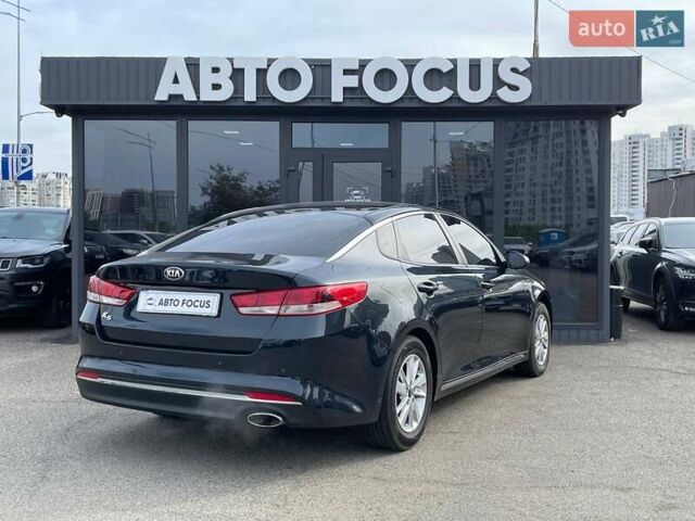 Черный Киа K5, объемом двигателя 2 л и пробегом 226 тыс. км за 10790 $, фото 6 на Automoto.ua