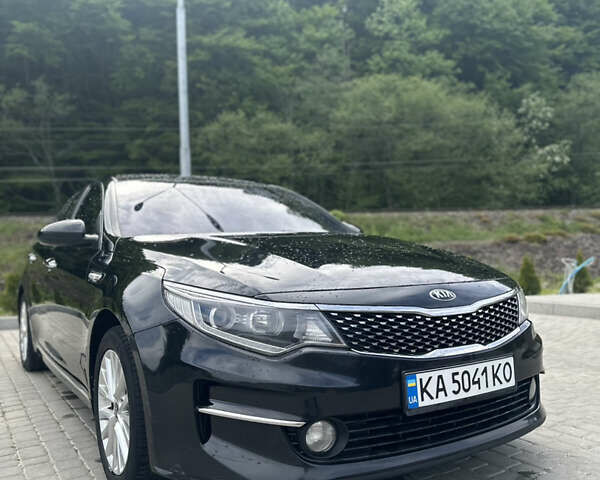Черный Киа K5, объемом двигателя 2 л и пробегом 192 тыс. км за 12000 $, фото 6 на Automoto.ua
