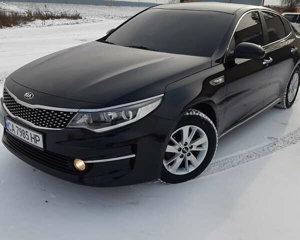 Черный Киа K5, объемом двигателя 2 л и пробегом 260 тыс. км за 12900 $, фото 1 на Automoto.ua