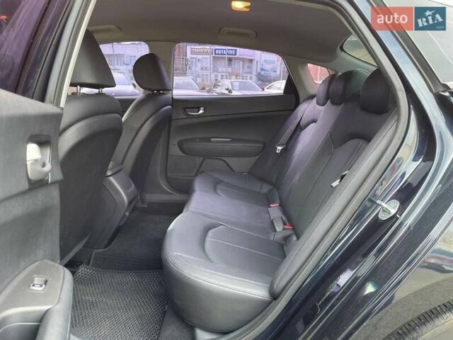 Черный Киа K5, объемом двигателя 2 л и пробегом 226 тыс. км за 10790 $, фото 8 на Automoto.ua