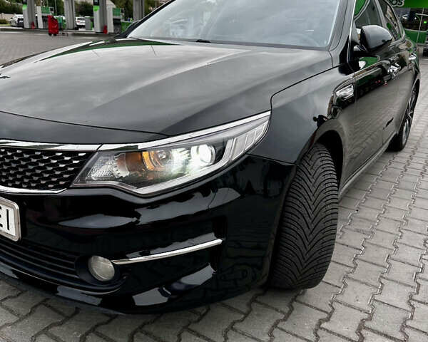 Черный Киа K5, объемом двигателя 2 л и пробегом 221 тыс. км за 11599 $, фото 2 на Automoto.ua
