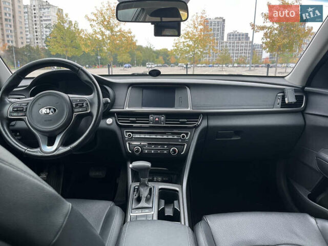 Черный Киа K5, объемом двигателя 2 л и пробегом 201 тыс. км за 13000 $, фото 6 на Automoto.ua