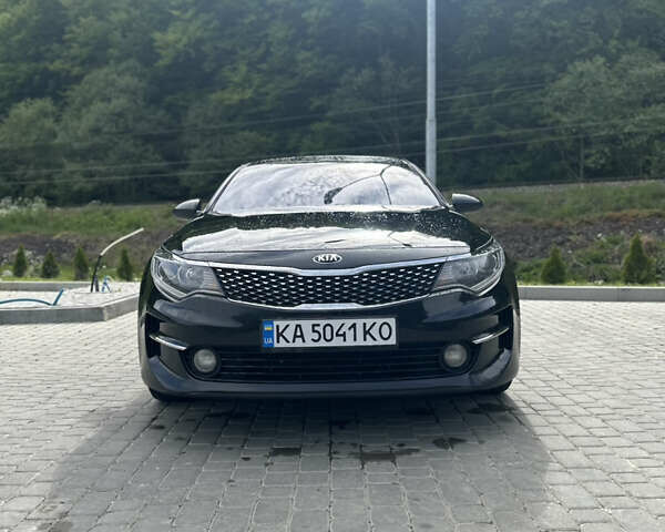 Черный Киа K5, объемом двигателя 2 л и пробегом 192 тыс. км за 12000 $, фото 1 на Automoto.ua