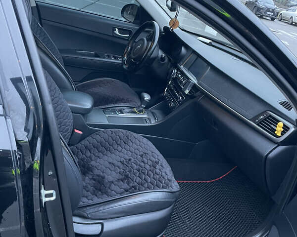 Черный Киа K5, объемом двигателя 2 л и пробегом 230 тыс. км за 13499 $, фото 7 на Automoto.ua