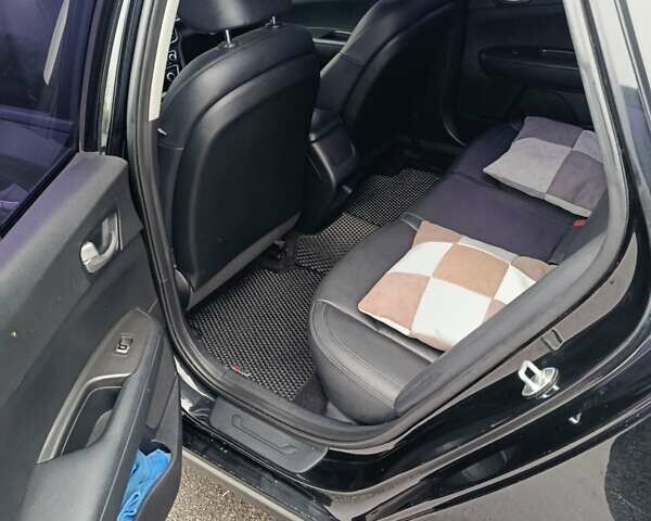 Чорний Кіа K5, об'ємом двигуна 2 л та пробігом 276 тис. км за 13200 $, фото 7 на Automoto.ua