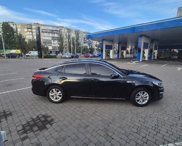 Черный Киа K5, объемом двигателя 2 л и пробегом 226 тыс. км за 12000 $, фото 3 на Automoto.ua