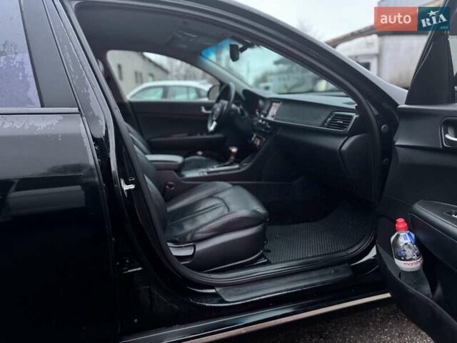 Черный Киа K5, объемом двигателя 2 л и пробегом 330 тыс. км за 10800 $, фото 8 на Automoto.ua