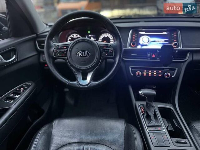 Черный Киа K5, объемом двигателя 2 л и пробегом 330 тыс. км за 10800 $, фото 5 на Automoto.ua