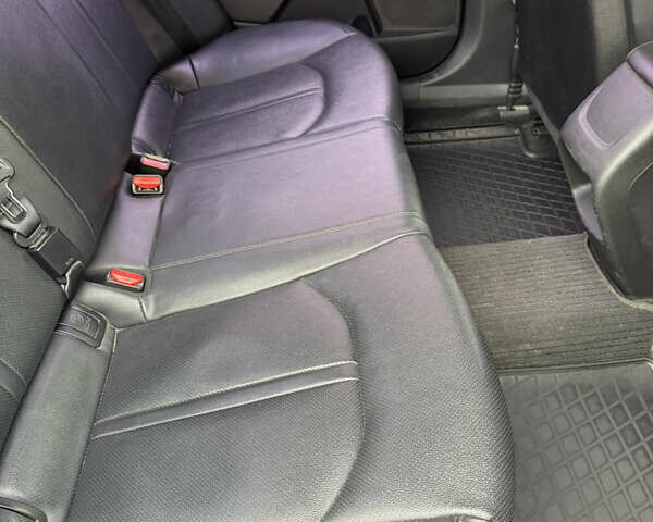 Чорний Кіа K5, об'ємом двигуна 2 л та пробігом 315 тис. км за 11500 $, фото 10 на Automoto.ua