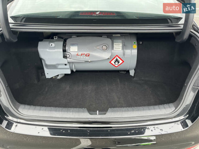 Черный Киа K5, объемом двигателя 2 л и пробегом 201 тыс. км за 13000 $, фото 5 на Automoto.ua
