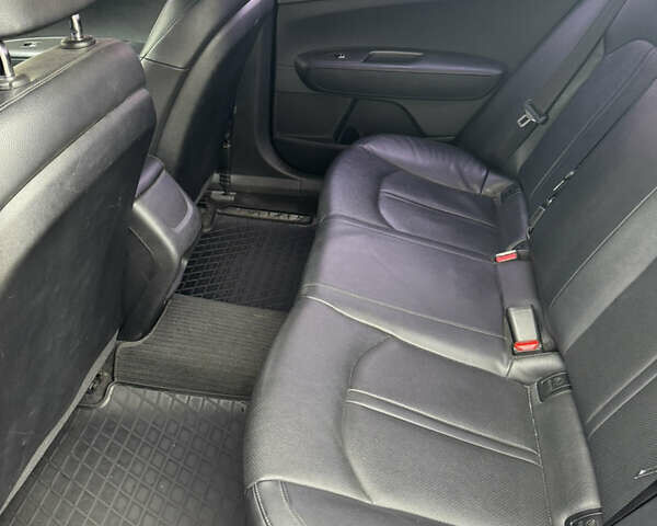 Чорний Кіа K5, об'ємом двигуна 2 л та пробігом 315 тис. км за 11500 $, фото 17 на Automoto.ua