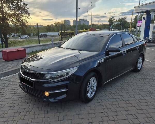 Черный Киа K5, объемом двигателя 2 л и пробегом 226 тыс. км за 12000 $, фото 5 на Automoto.ua