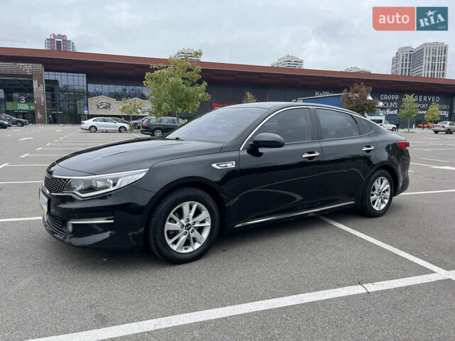 Черный Киа K5, объемом двигателя 2 л и пробегом 201 тыс. км за 13000 $, фото 1 на Automoto.ua