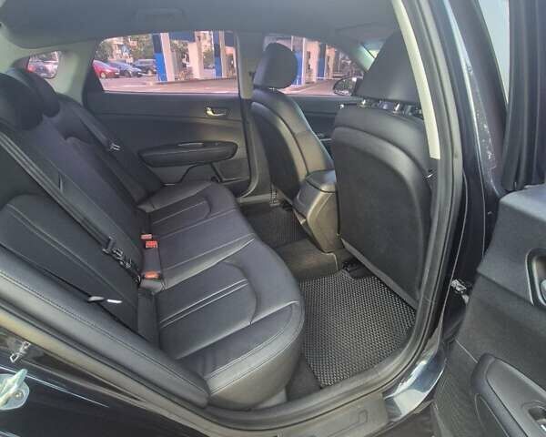 Черный Киа K5, объемом двигателя 2 л и пробегом 226 тыс. км за 12000 $, фото 6 на Automoto.ua
