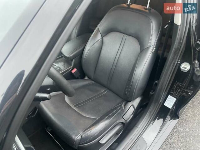 Черный Киа K5, объемом двигателя 1.7 л и пробегом 190 тыс. км за 12999 $, фото 19 на Automoto.ua