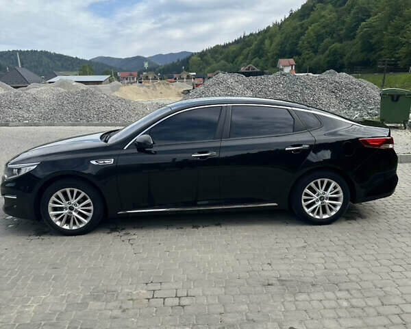 Черный Киа K5, объемом двигателя 2 л и пробегом 192 тыс. км за 12000 $, фото 4 на Automoto.ua