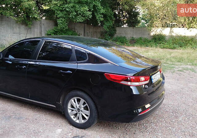 Чорний Кіа K5, об'ємом двигуна 2 л та пробігом 258 тис. км за 13500 $, фото 4 на Automoto.ua
