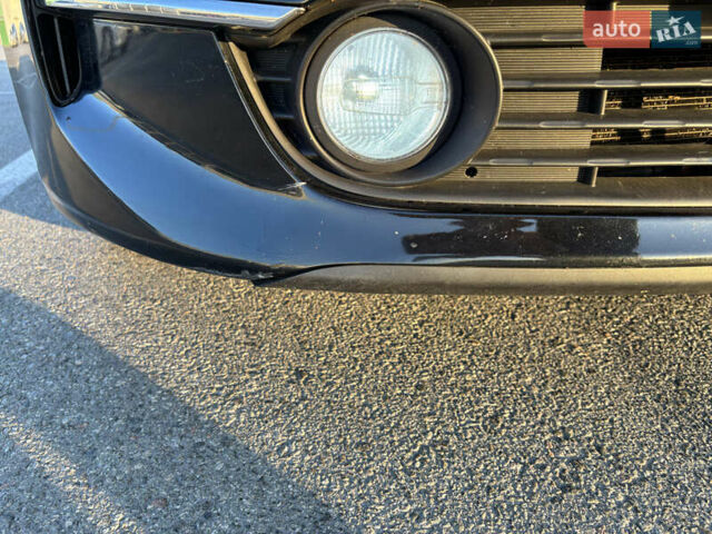 Черный Киа K5, объемом двигателя 2 л и пробегом 270 тыс. км за 12000 $, фото 14 на Automoto.ua