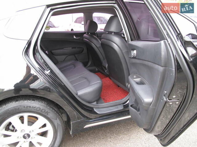 Чорний Кіа K5, об'ємом двигуна 0 л та пробігом 210 тис. км за 13900 $, фото 59 на Automoto.ua