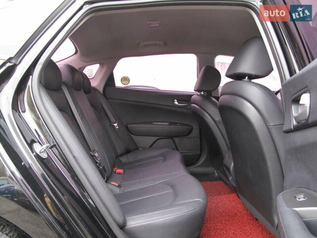 Чорний Кіа K5, об'ємом двигуна 0 л та пробігом 210 тис. км за 13900 $, фото 61 на Automoto.ua