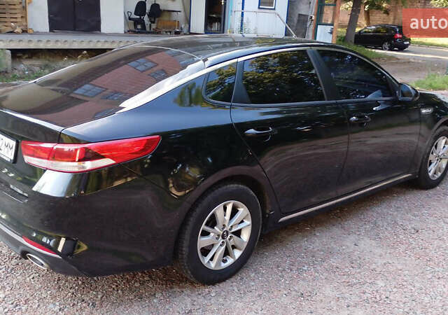 Чорний Кіа K5, об'ємом двигуна 2 л та пробігом 258 тис. км за 13500 $, фото 5 на Automoto.ua