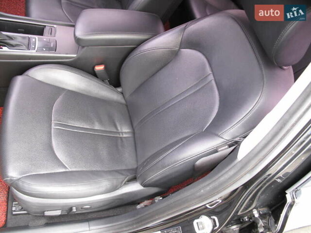 Чорний Кіа K5, об'ємом двигуна 0 л та пробігом 210 тис. км за 13900 $, фото 27 на Automoto.ua