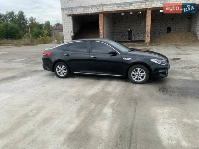 Чорний Кіа K5, об'ємом двигуна 2 л та пробігом 298 тис. км за 11000 $, фото 2 на Automoto.ua